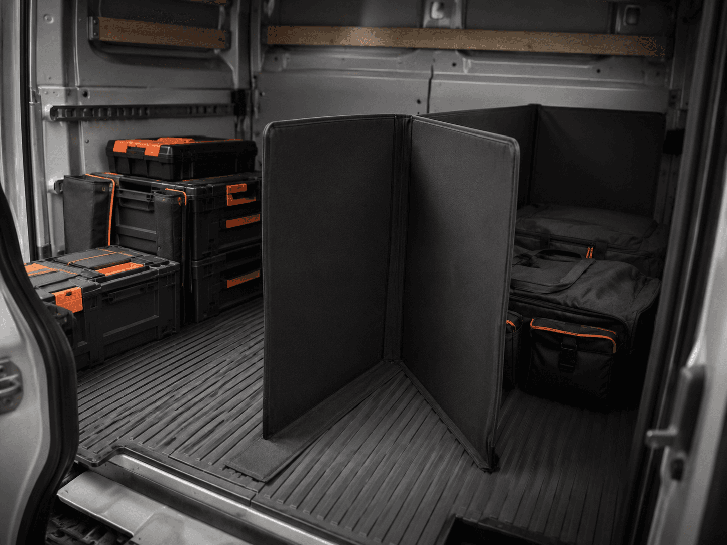 Foldable Cargo Divider shown as an unbranded no-drill van storage product