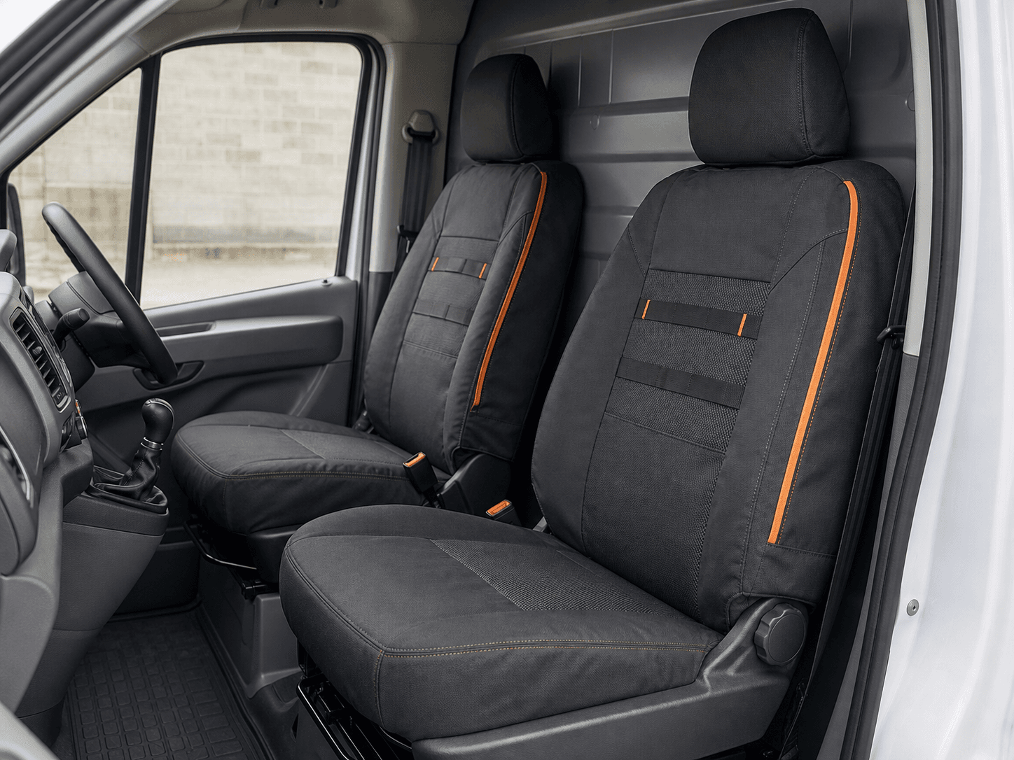 Heavy-Duty Seat Cover Pair shown as an unbranded no-drill van storage product
